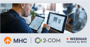 Business professional analyzing data on multiple screens during a webinar on data-driven communication strategies.